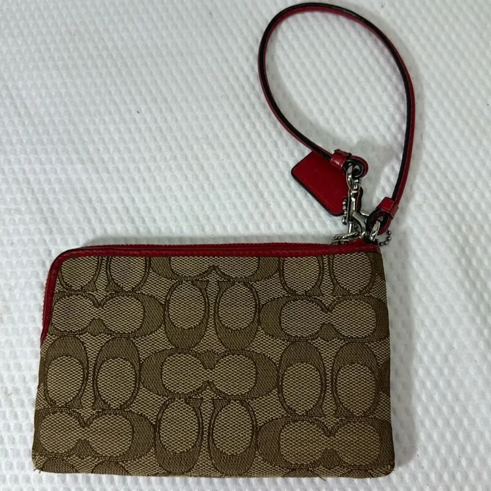 Coach tan and red Wristlet with Logo Pattern
